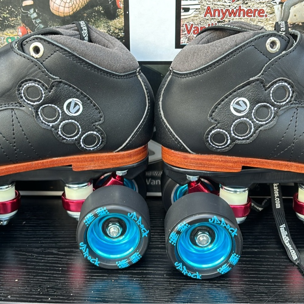 Roller Skates with Blue Wheels and Orange Soles